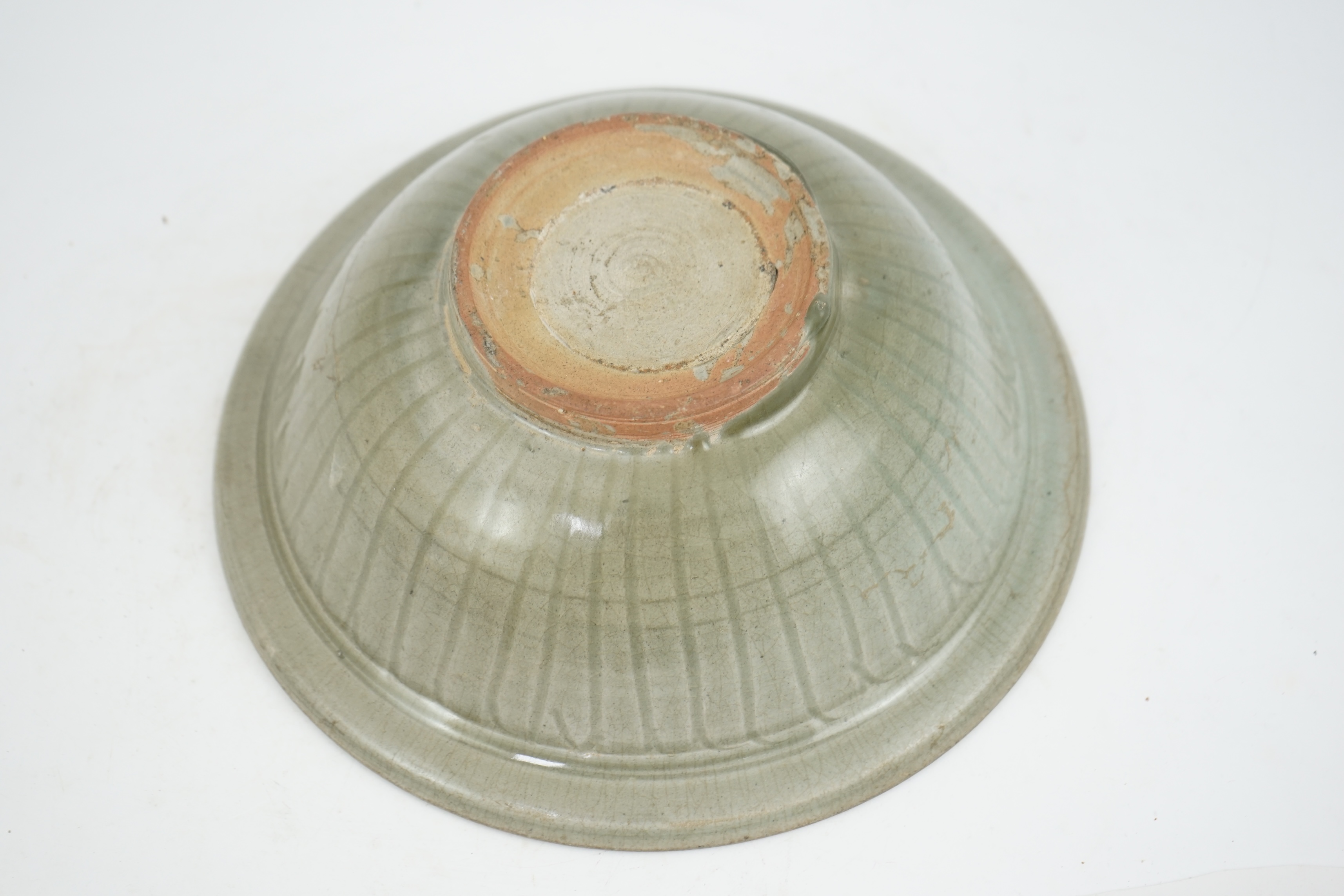 A large Thai celadon glazed bowl, Sawankhalok kilns, 14th / 15th century